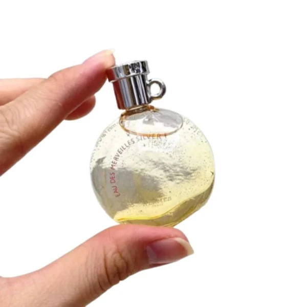 Hermès Merveilles Silver Orange 5 ml miniature de parfum Hermès en flacon élégant format voyage et collection de luxe.
